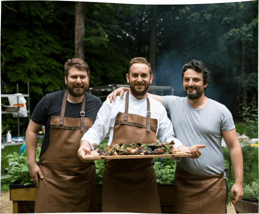 Three Chef showing a dinner made of seasonal ingredients